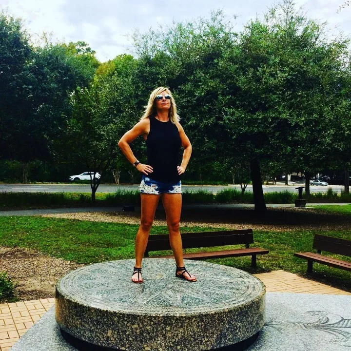 girl standing on a platform