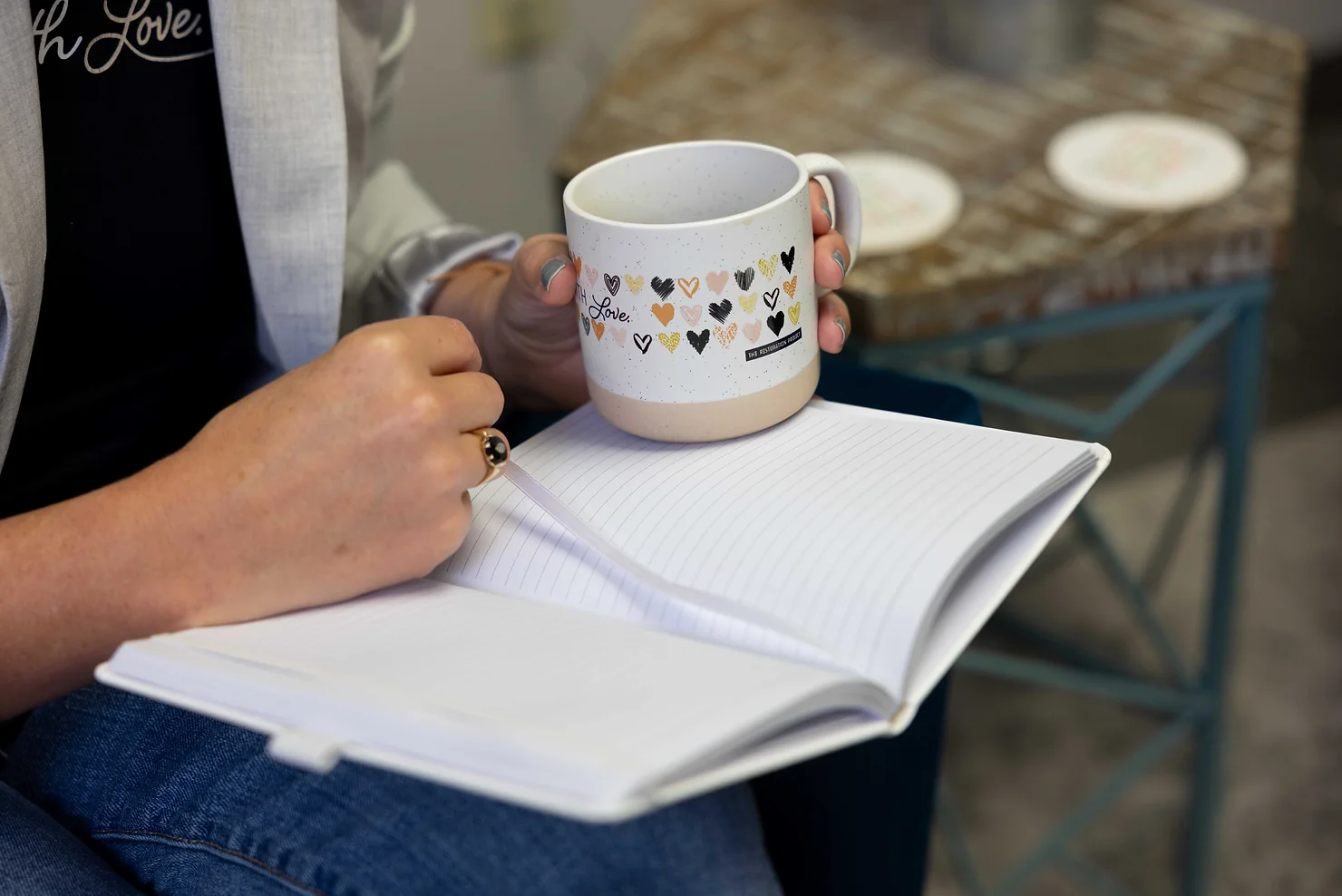 An open book with coffee mug