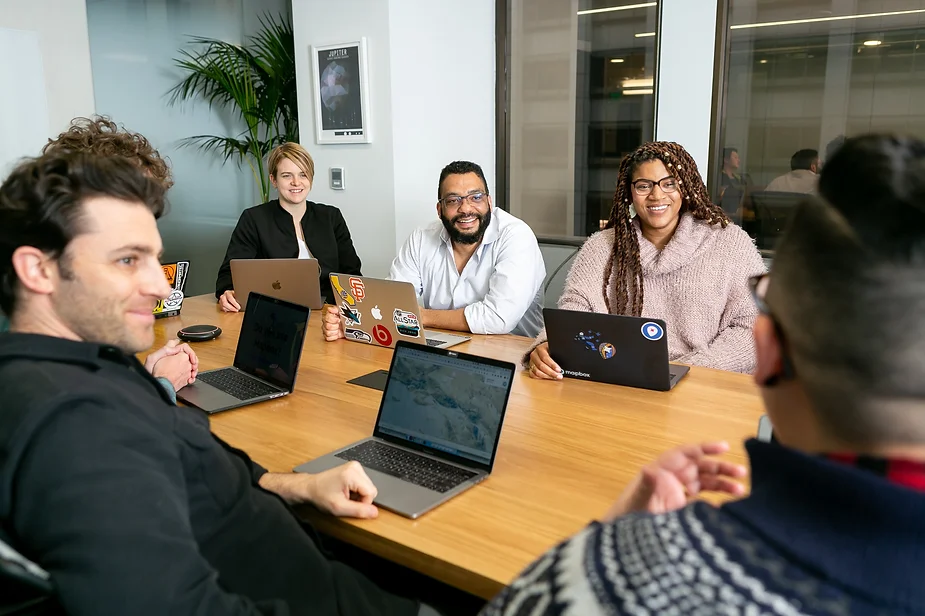 Group of people sitting in the conference