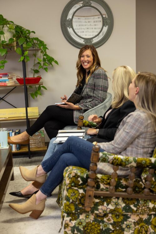 sarah smiling in a team meeting