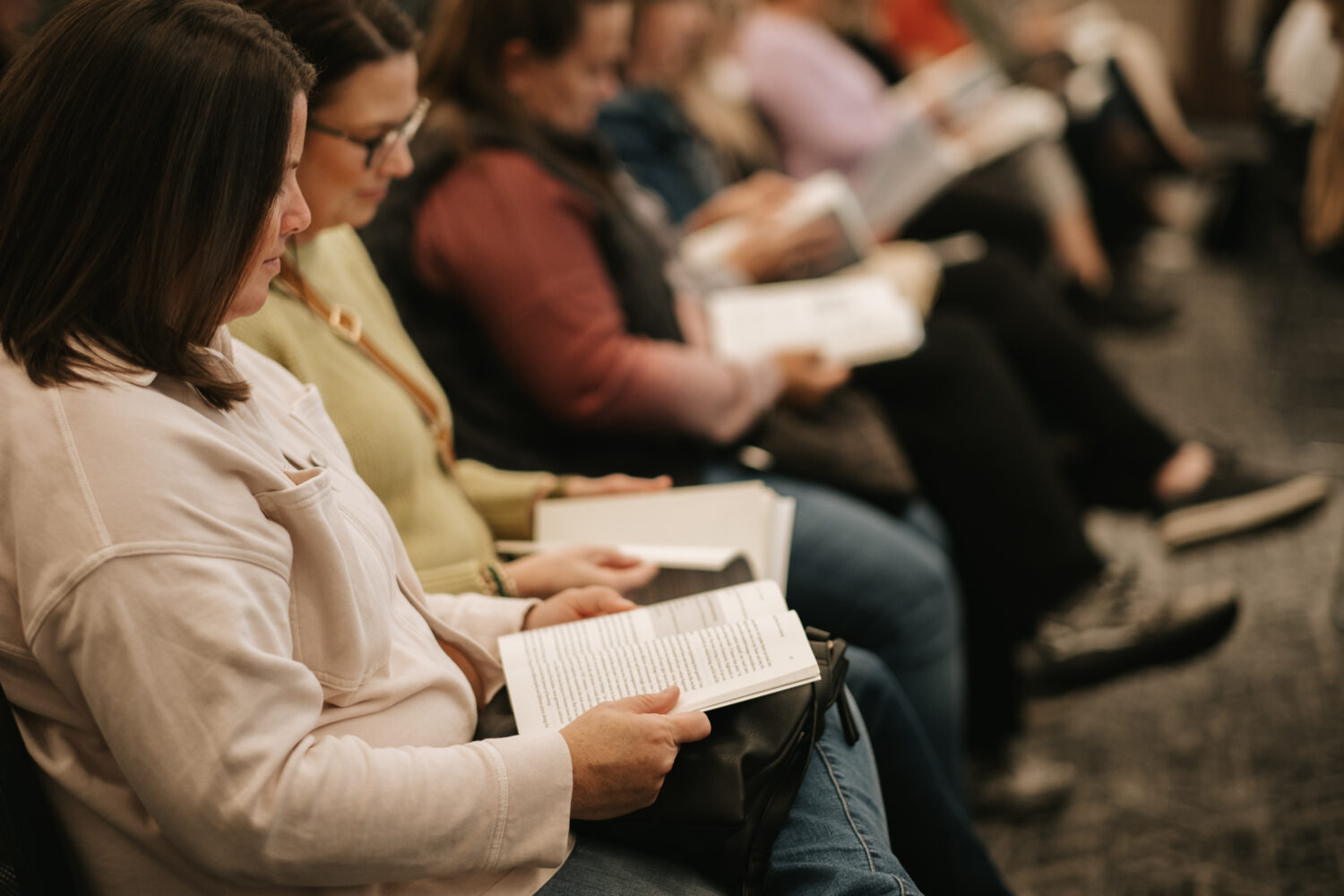 Women reading Take It All Apart book as a group